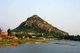 India: Late afternoon and people gather to bathe in a lake at the southern end of the Western Ghats near Nagercoil, Tamil Nadu